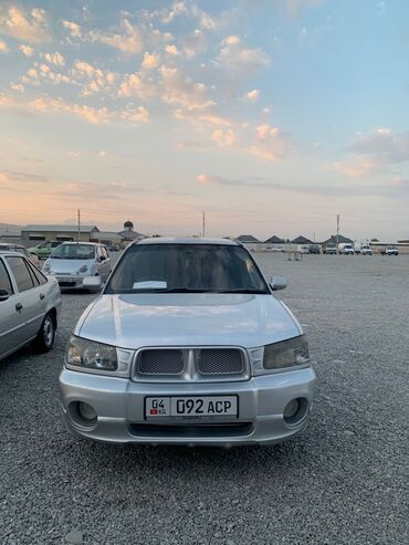 ролс ройс машина: Кроссовер Subaru Forester серебристого цвета с характерными чертами