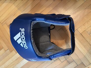 Maskalar, eynəklər: Adidas boks/qayıkçı başlığı – mavi rəng - Brend: Adidas - Rəng: Tünd
