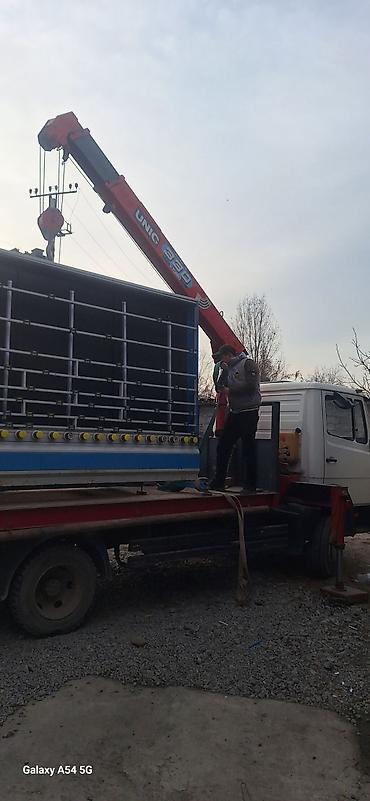 Услуги манипулятора (кран-борта) UNIC - Погрузка, разгрузка и