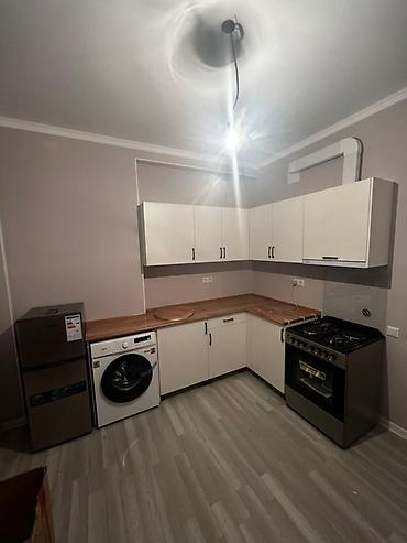 Кухонные гарнитуры: Кухонные гарнитуры на заказ - Современный минимализм: ровные фасады — 7