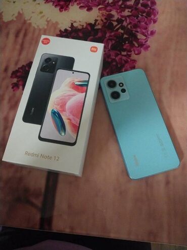 дешевые телефоны флай: Redmi Note 12, 128 ГБ, цвет - Синий, Отпечаток пальца, Две SIM карты, Face ID