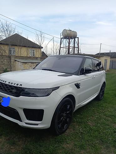 range rover on susesi: Range Rover Sport – ağ kuzov, qara dam və qara detallarla dinamik — 1