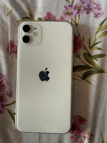 Мобильные телефоны: IPhone 11, белый цвет. Характеристики и особенности: - Экран Liquid — 2