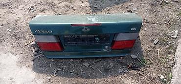альмера классик: Крышка багажника Nissan Almera класик Н 15 (надписи Almera, GX). Цвет — 1