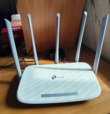 ошка роутер: Wi-Fi роутер, двухдиапазонный. Archer C60 обладает 5 антеннами, три из