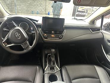 тойота аква гибрид: Toyota Corolla: 2021 г., 1.8 л, Гибрид, Седан — 8
