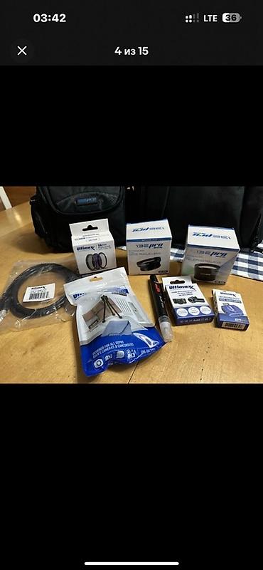 Фотоаппараты: Зеркальная камера Canon EOS 2000D с комплектом аксессуаров. Основные — 5