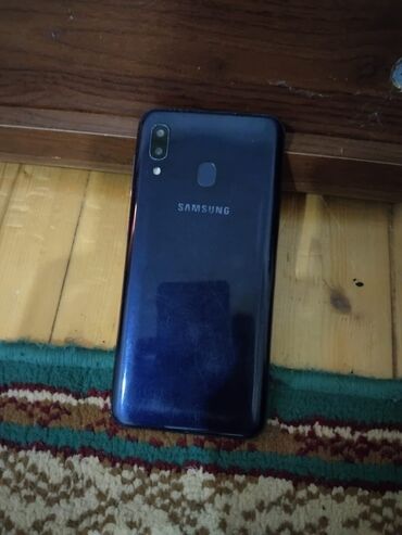 telfon satşı: Samsung A20, 32 GB, rəng - Göy, Barmaq izi, İki sim kartlı