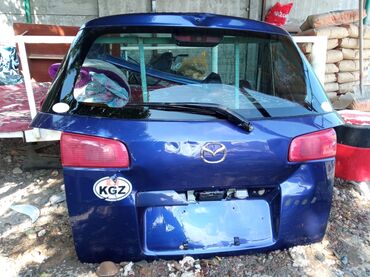 продаю демио: Крышка багажника Mazda цвет - Синий