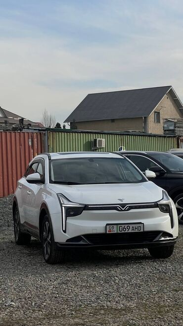 Другие автомобили: Электромобиль NETA Uбелый кроссовер. Кузов и дизайн: - Современная — 2