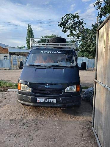 q 7: Грузовой фургон на базе микроавтобуса Ford Transit с высокими бортами — 4