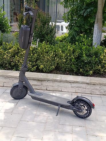 Электротранспорт: Elektrikli skuter – şık boz dizayn - Geniş və sürüşməyən gövdə — 1