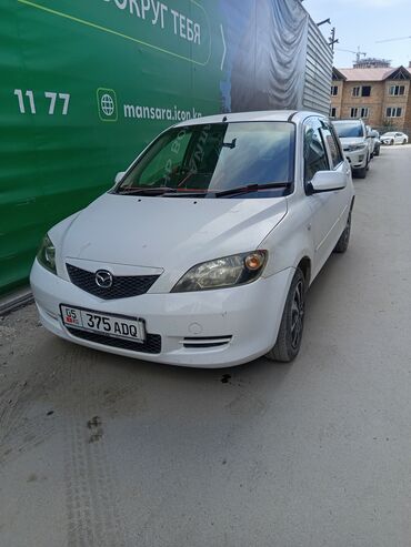 чехлы на ми: Mazda Demio: 2003 г., 1.3 л, Автомат, Бензин, Хэтчбэк