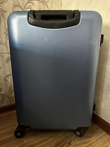trolly bag: Чемодан на колёсах, цвет стальной синий. Особенности: - Прочный — 5