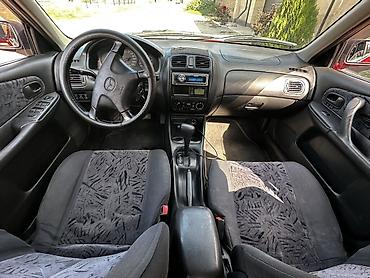крафтер 2 5: Mazda 323: 1999 г., 1.8 л, Автомат, Бензин, Хэтчбэк — 6