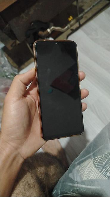 telefon altlıgı: Cubot A10 smartfonu. Şəkillərdə göründüyü kimi cihazın arxa — 5