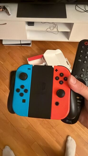 Kompüter, noutbuk və planşetlər: Nintendo Switch konsol dəsti – Neon Blue/Neon Red Joy‑Con Dəst