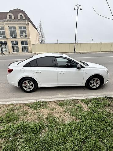 cruz dice: Chevrolet Cruze: 1.8 l | 2012 il 185000 km Sedan — 4