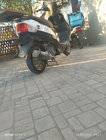 elektrikli scooter en ucuz: Skuter – şəhər içi gediş‑gəliş və çatdırılma üçün praktik model - — 2
