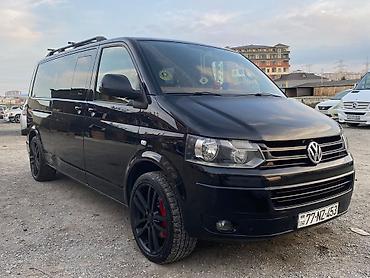 4 fara buferi: Volkswagen Transporter T5, qara rəng, miniven/kombi tipli gövdə. Əsas — 2