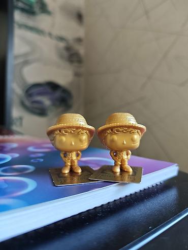 Коллекционная мини-фигурки в золотистом цвете. Меняю одну золотую