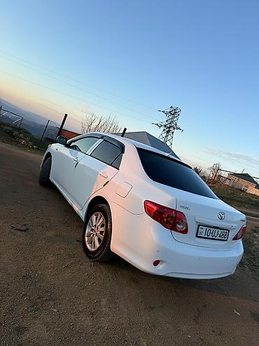 toyota aygo: Toyota Corolla (E140), ağ rəng, sedan gövdə. Xarici: - Orijinal — 10