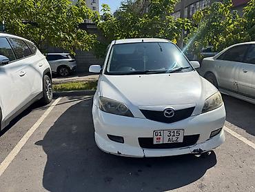 dio 27: Mazda Demio: 2004 г., 1.3 л, Автомат — 5