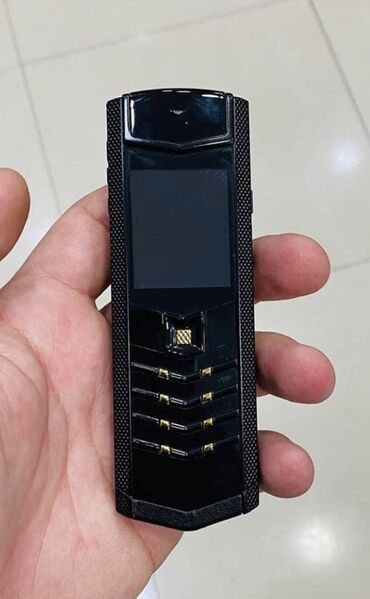 телефон fly ezzy 5: Vertu 1 ТБ, цвет - Черный