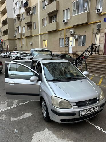 Hyundai: Hyundai Getz, gümüşü rəng Texniki xüsusiyyətlər: - Yanacaq növü — 4