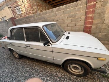 запорожец машина: Белый седан ВАЗ-2106, классический четырехдверный автомобиль с