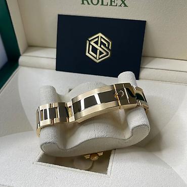 meta eynək: Rolex Submariner Date – 18 kt sarı qızıl, mavi siferblat və bezel — 2