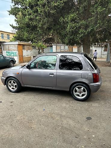 bmw e 38: Nissan Micra (K11) hetçbek, 3 qapı, boz rəng. - Yığcam şəhər — 4