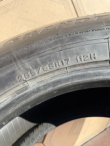 Шиналар жана дисктер: Летняя японская шина Dunlop Grandtrek - Размер: 265/65 R17 - Год — 4