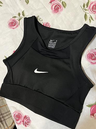 спортивный жилет: Подборка женской одежды (4 предмета): 1) Спортивный топ Nike Dri-FIT — 1