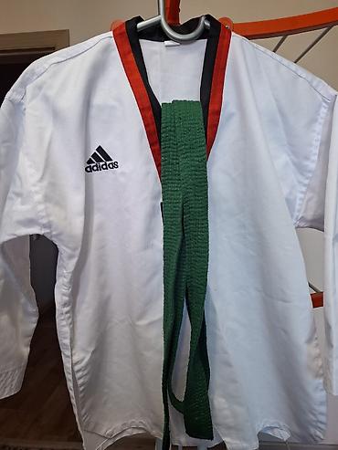 нашивка: ДЕТСКИЙ Тхэквондо-кимоно Adidas (dobok) с зелёным поясом ВОЗРАСТ 9-10 — 2
