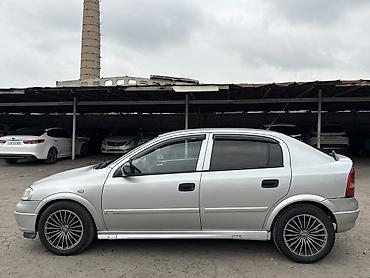oka maşin: Opel Astra: 1.6 l | 1998 il 397 km Hetçbek — 2