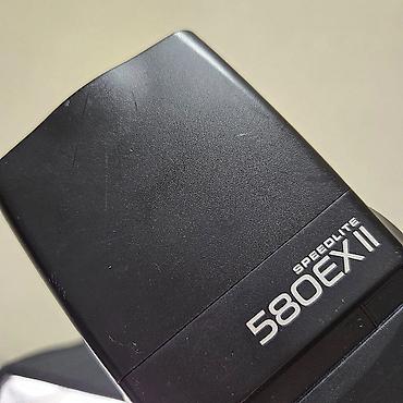 Освещение: Вспышка Canon Speedlite 580EX II - Совместимость: зеркальные и — 15
