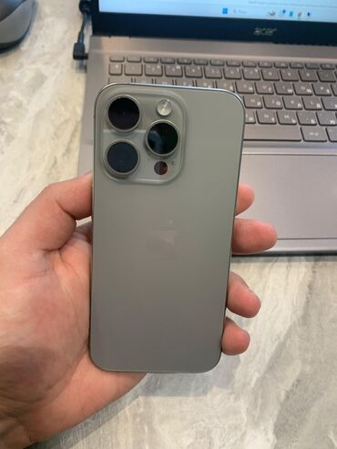 Apple iPhone: IPhone 15 Pro, 128 GB, Natural Titanium, Face ID — 7