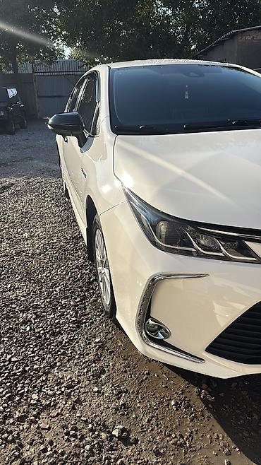 накитка на авто: Toyota Corolla: 2021 г., 1.8 л, Вариатор, Гибрид, Седан — 9