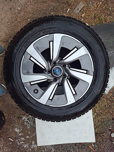 Шины и диски: Комплект зимних колес для кроссоверов/SUV. Состав: - Шины Goodyear — 1