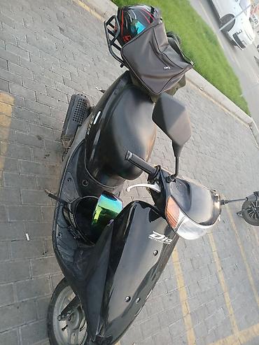 Скутер Honda Dio, 2‑тактный городской мини-скутер в черном цвете