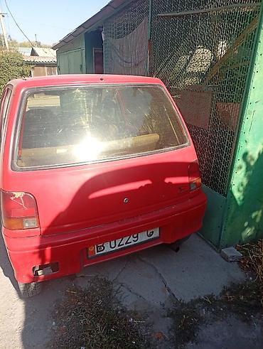 12 220: Daihatsu Cuore: 1991 г., 0.8 л — 3