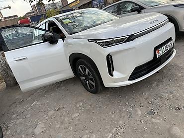 GAC: Aion i50 (электромобиль, кроссовер/SUV), белый цвет.530 запасом хода — 4