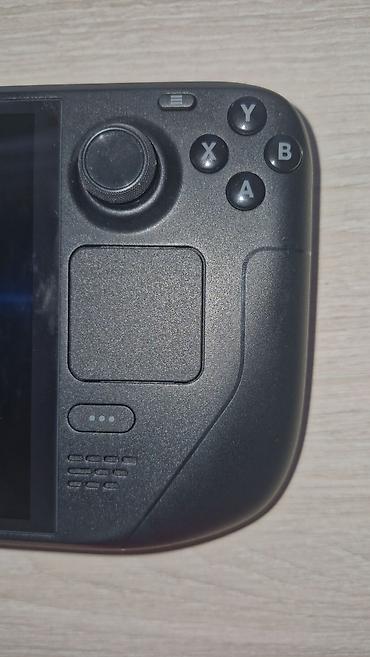 nintendo switch lite сколько стоит: Портативная игровая консоль Valve Steam Deck OLED, 512GB. Практически — 7
