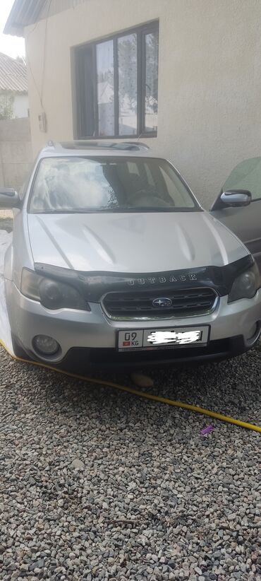 продаю или меняю на дом: Универсал Subaru Outback серебристого цвета с рейлингами на крыше и