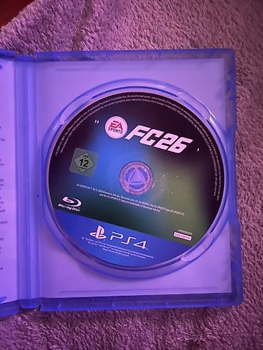 Видеоигры: EA SPORTS FC 26 для PlayStation 4 (диск Blu‑ray в фирменном боксе). - — 2
