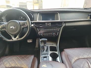 magar satisi: Kia Optima SXL Turbo – ağ rəngli, sedan kuzov. Güclü və qənaətcil — 10