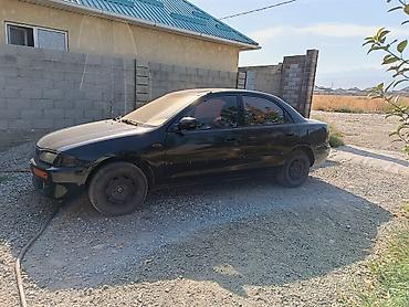 mazda kronos: Mazda 323: 1999 г., 1.5 л, Механика, Бензин, Седан — 3