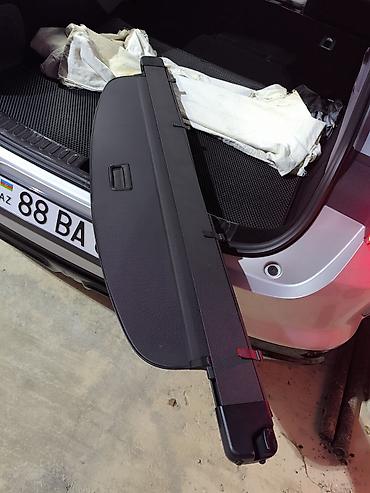 04 baqaj: Audi Q7 2007 ci il yük yerinin jalüz örtüyü (baqaj roleti) - Orijinal — 2