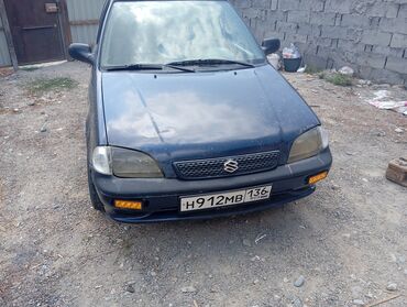 купить диски r16 4x114.3: Автомобиль Suzuki Swift синего цвета с кузовом седан. Модель имеет